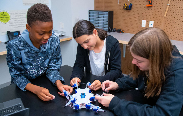 Robotics summer STEM camp teamwork